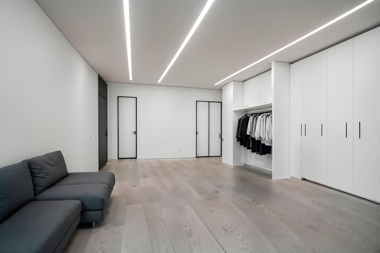 minimalist-style (clothing store interior) . with functional furniture and clean lines and lots of light and focus on the shape, colour and texture of just a few of essential elements and a monochromatic palette with colour used as an accent and an open floor plan and functional furniture. . cinematic photo, highly detailed, cinematic lighting, ultra-detailed, ultrarealistic, photorealism, 8k. minimalist interior design style. masterpiece, cinematic light, ultrarealistic+, photorealistic+, 8k, raw photo, realistic, sharp focus on eyes, (symmetrical eyes), (intact eyes), hyperrealistic, highest quality, best quality, , highly detailed, masterpiece, best quality, extremely detailed 8k wallpaper, masterpiece, best quality, ultra-detailed, best shadow, detailed background, detailed face, detailed eyes, high contrast, best illumination, detailed face, dulux, caustic, dynamic angle, detailed glow. dramatic lighting. highly detailed, insanely detailed hair, symmetrical, intricate details, professionally retouched, 8k high definition. strong bokeh. award winning photo.