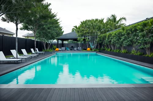 photo from pinterest of minimalist-style designed (outdoor pool area ) with pool and pool lights and pool lounge chairs and pool. . with lots of light and focus on the shape, colour and texture of just a few of essential elements and clean lines and a monochromatic palette with colour used as an accent and an open floor plan and functional furniture and lots of light. . cinematic photo, highly detailed, cinematic lighting, ultra-detailed, ultrarealistic, photorealism, 8k. trending on pinterest. minimalist design style. masterpiece, cinematic light, ultrarealistic+, photorealistic+, 8k, raw photo, realistic, sharp focus on eyes, (symmetrical eyes), (intact eyes), hyperrealistic, highest quality, best quality, , highly detailed, masterpiece, best quality, extremely detailed 8k wallpaper, masterpiece, best quality, ultra-detailed, best shadow, detailed background, detailed face, detailed eyes, high contrast, best illumination, detailed face, dulux, caustic, dynamic angle, detailed glow. dramatic lighting. highly detailed, insanely detailed hair, symmetrical, intricate details, professionally retouched, 8k high definition. strong bokeh. award winning photo.