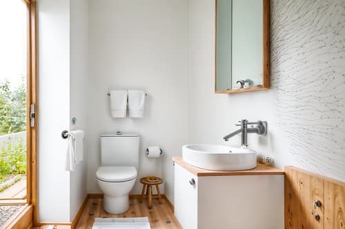 photo from pinterest of airbnb-style interior designed (toilet interior) with sink with tap and toilet with toilet seat up and toilet paper hanger and sink with tap. . with natural materials and elements and open and natural lighting and scandinavian style and simple, clean lines and simplistic furniture and practicality and functionality and simple color palette and neutral walls and textures and natural materials and elements. . cinematic photo, highly detailed, cinematic lighting, ultra-detailed, ultrarealistic, photorealism, 8k. trending on pinterest. airbnb interior design style. masterpiece, cinematic light, ultrarealistic+, photorealistic+, 8k, raw photo, realistic, sharp focus on eyes, (symmetrical eyes), (intact eyes), hyperrealistic, highest quality, best quality, , highly detailed, masterpiece, best quality, extremely detailed 8k wallpaper, masterpiece, best quality, ultra-detailed, best shadow, detailed background, detailed face, detailed eyes, high contrast, best illumination, detailed face, dulux, caustic, dynamic angle, detailed glow. dramatic lighting. highly detailed, insanely detailed hair, symmetrical, intricate details, professionally retouched, 8k high definition. strong bokeh. award winning photo.